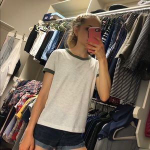 Cute gray shirt with green detailing